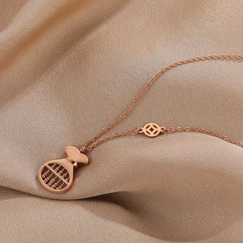 2020 new High quality fashion purse Ruyi abacus female titanium steel necklace clavicle necklace birthday gift wholesale
2020 new High quality fashion purse Ruyi abacus female titanium steel necklace clavicle necklace birthday gift wholesale