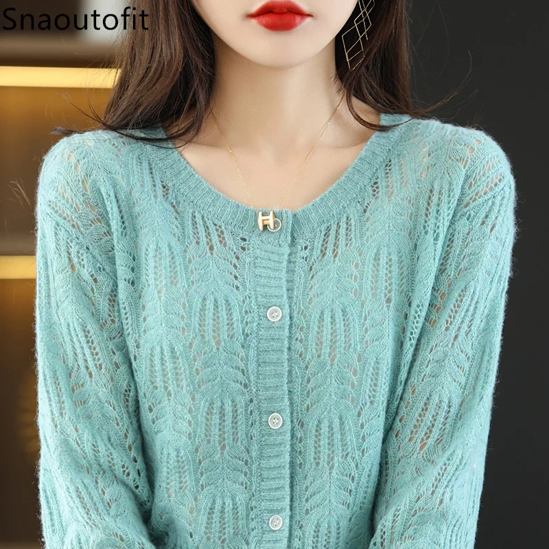 Spring and Autumn New Knitted Pure Wool Cardigan Women's Round Neck Hollow Loose Sweater Coat Chic Top Fashion Women's Clothing
Spring and Autumn New Knitted Pure Wool Cardigan Women's Round Neck Hollow Loose Sweater Coat Chic Top Fashion Women's Clothing