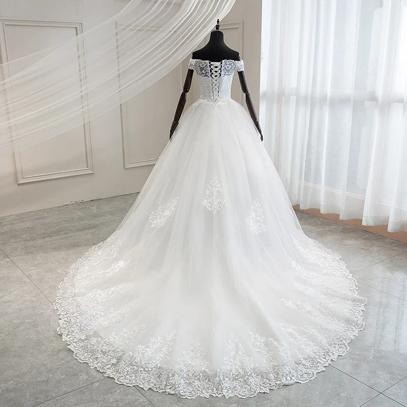 White Off the Shoulder Vestido De Noiva plus size ball gown Wedding Dress Custom-made lace applique Bridal wedding gown Marriage
White Off the Shoulder Vestido De Noiva plus size ball gown Wedding Dress Custom-made lace applique Bridal wedding gown Marriage