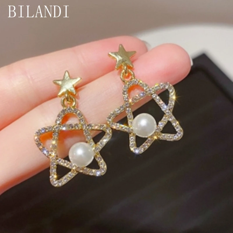 Bilandi S925 needle Women Jewelry Star Earrings New Design Simulated Pearl Crystal Drop Earrings For Women Gifts Drop Shipping
Bilandi S925 needle Women Jewelry Star Earrings New Design Simulated Pearl Crystal Drop Earrings For Women Gifts Drop Shipping