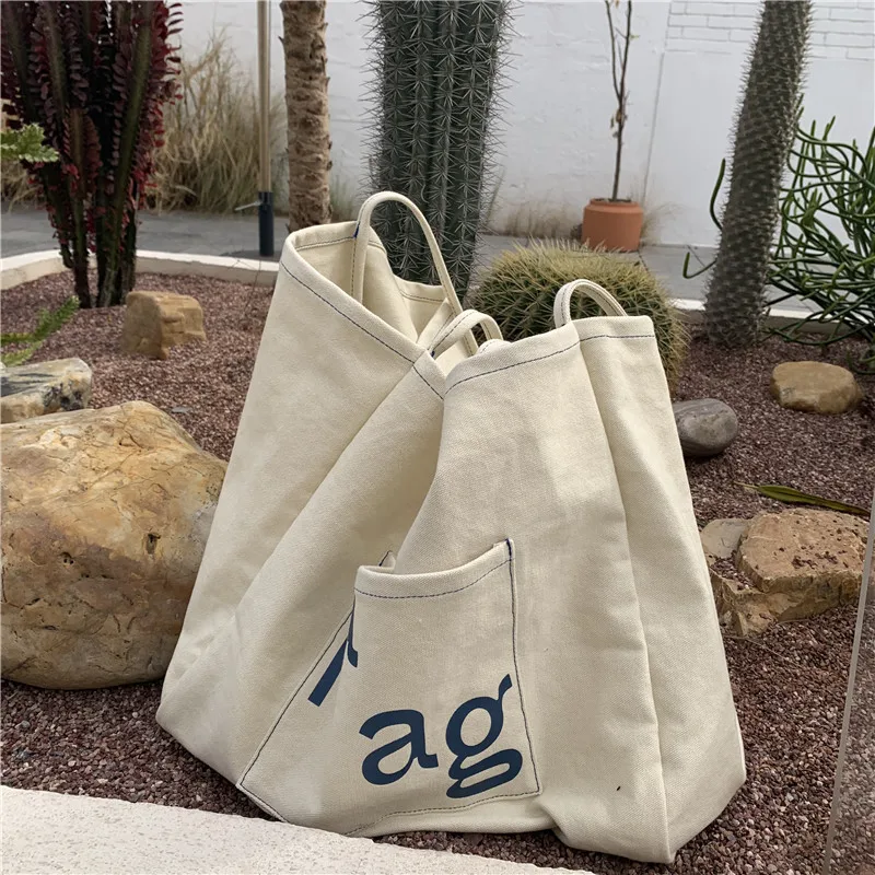 Korean Fashion Letter Canvas Shoulder Bags for Women 2021 New Large Capacity Totes Shopping Book Bag Student Girls Handbag Purse
Korean Fashion Letter Canvas Shoulder Bags for Women 2021 New Large Capacity Totes Shopping Book Bag Student Girls Handbag Purse