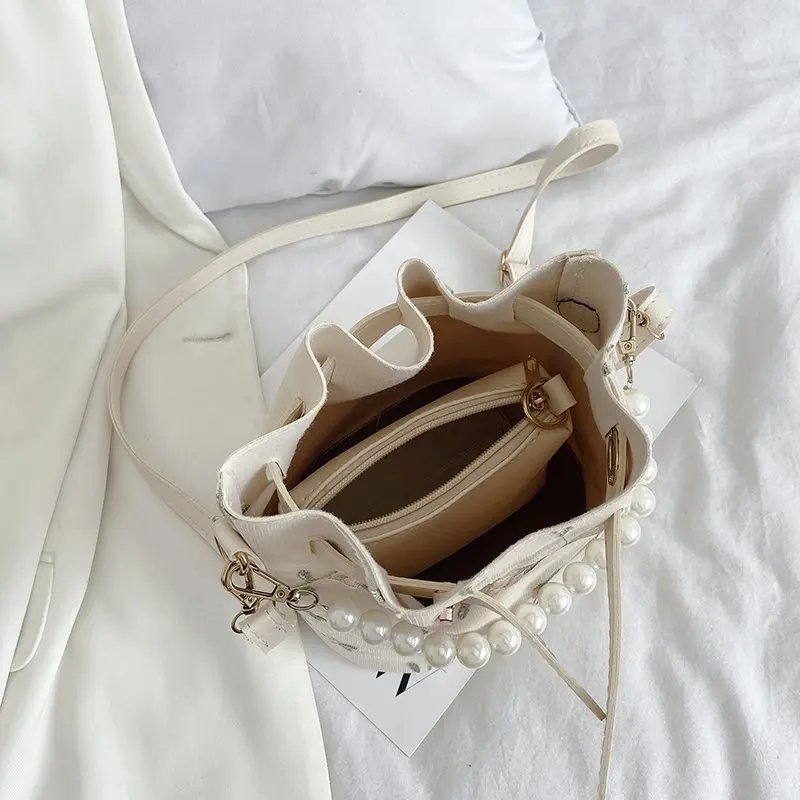 Women's Bag White Summer Pearl Protable Ladies Pu Crossbody Bucket Bag Embroidery Leaves Large Capacity Shoulder Composite Bags
Women's Bag White Summer Pearl Protable Ladies Pu Crossbody Bucket Bag Embroidery Leaves Large Capacity Shoulder Composite Bags