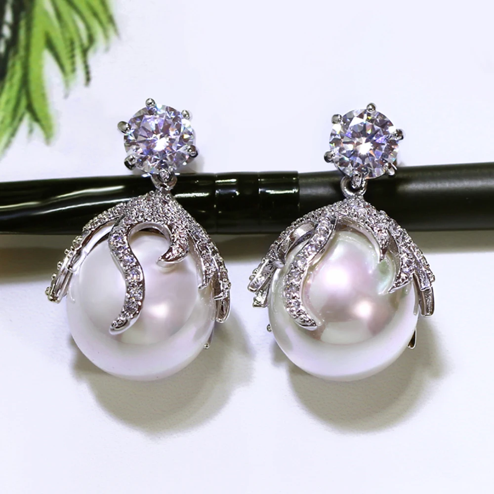 Dangle Pearl Drop earrings for Wedding Party pave AAA cubic zirconia crystal in White and Gold color Bridal white pearls jewelry 
Dangle Pearl Drop earrings for Wedding Party pave AAA cubic zirconia crystal in White and Gold color Bridal white pearls jewelry