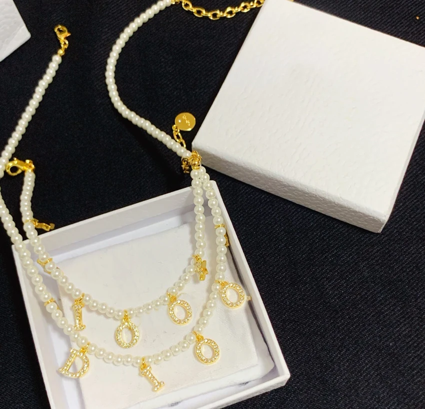 Fashion Brand Letter Charm Pendant Beaded Strands Pearl Bracelets Chokers Necklace Chain For Women Party Wedding Lovers Gift
Fashion Brand Letter Charm Pendant Beaded Strands Pearl Bracelets Chokers Necklace Chain For Women Party Wedding Lovers Gift