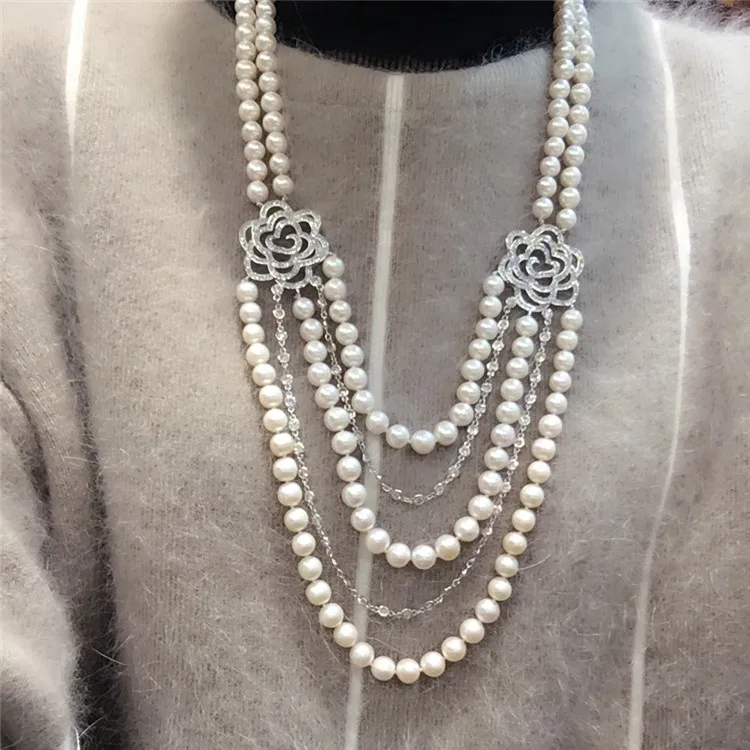 Hand knotted natural 7-8mm white freshwater pearl flowers zircon accessories long necklace sweater chain fashion jewelry
Hand knotted natural 7-8mm white freshwater pearl flowers zircon accessories long necklace sweater chain fashion jewelry