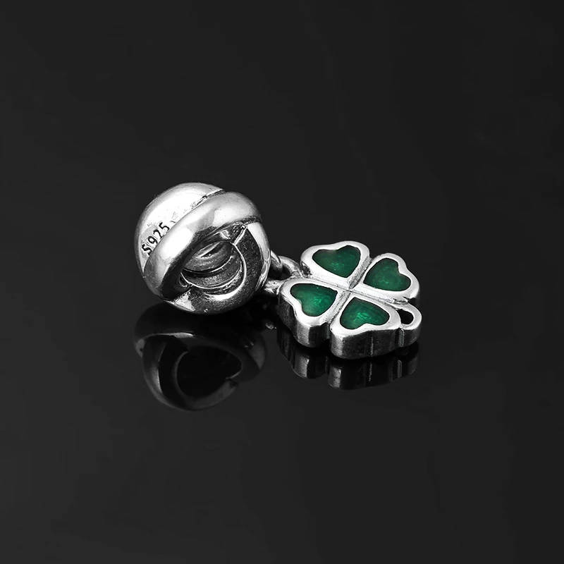 Кулон в виде сердца из серебра 925 пробы с зеленой эмалью четырехлистного клевера