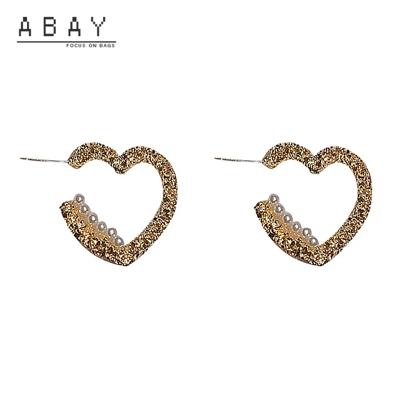 S925 Silver Needle Love Pearl Earrings Women's New Hot Sale Simple Fashion Gold Temperament Advanced Sense Ear Pendant Wholesale
S925 Silver Needle Love Pearl Earrings Women's New Hot Sale Simple Fashion Gold Temperament Advanced Sense Ear Pendant Wholesale