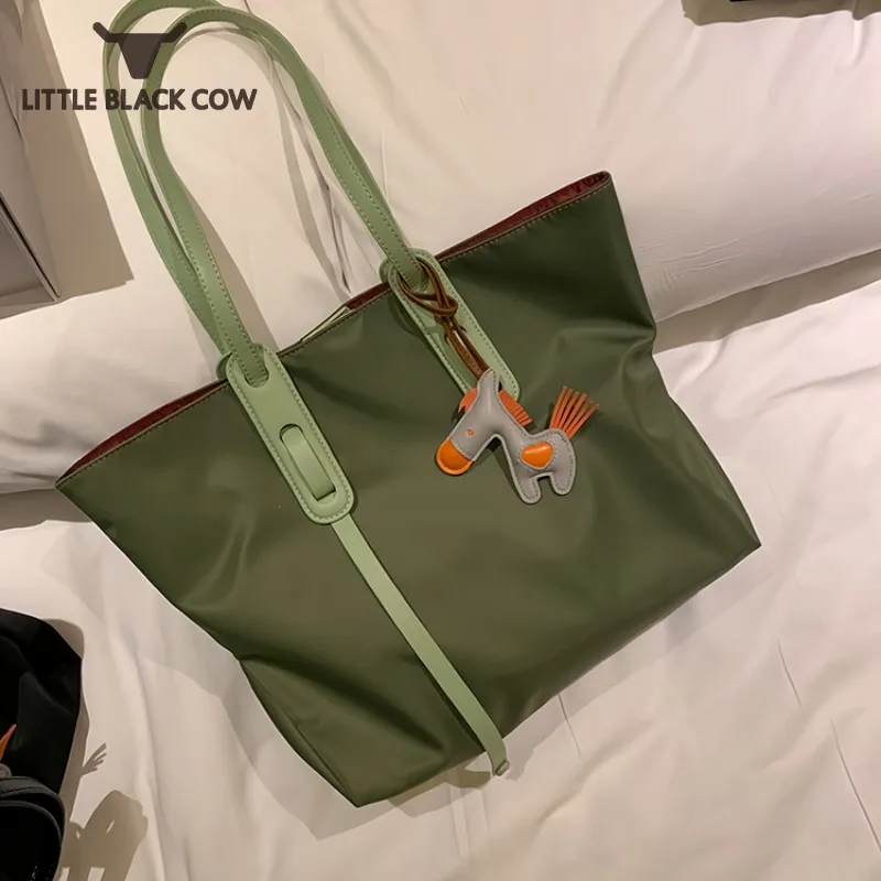 Women High Capacity Nylon Canvas Big Mother Bags Leisure Solid Color Shoulder Tote Handbag Office Ladies Fashion Composite Bag
Women High Capacity Nylon Canvas Big Mother Bags Leisure Solid Color Shoulder Tote Handbag Office Ladies Fashion Composite Bag