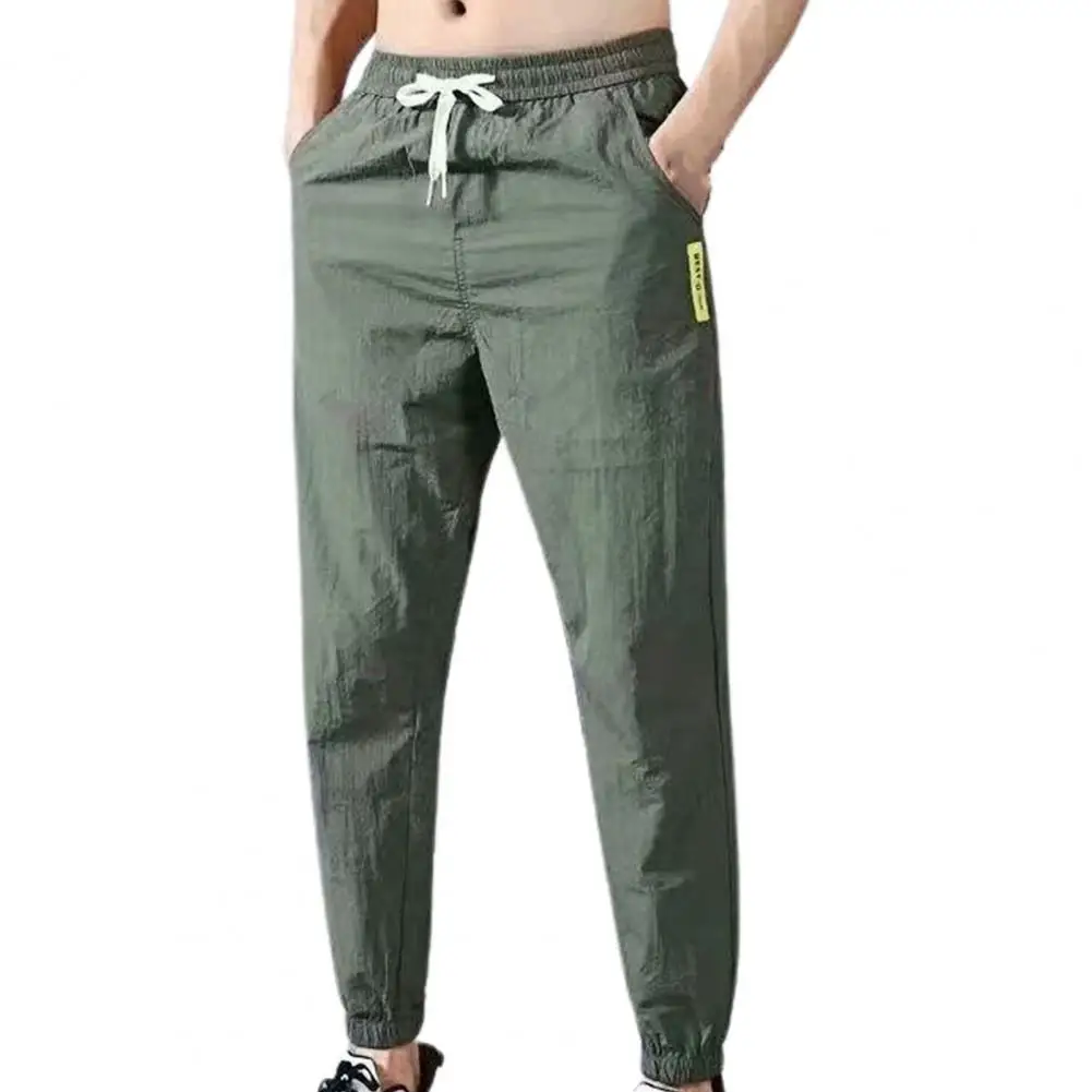 Summer Men Pants Solid Color Plus Size Fashion Casual Trousers Drawstring Ankle Tied Pockets Trousers Sports
Summer Men Pants Solid Color Plus Size Fashion Casual Trousers Drawstring Ankle Tied Pockets Trousers Sports