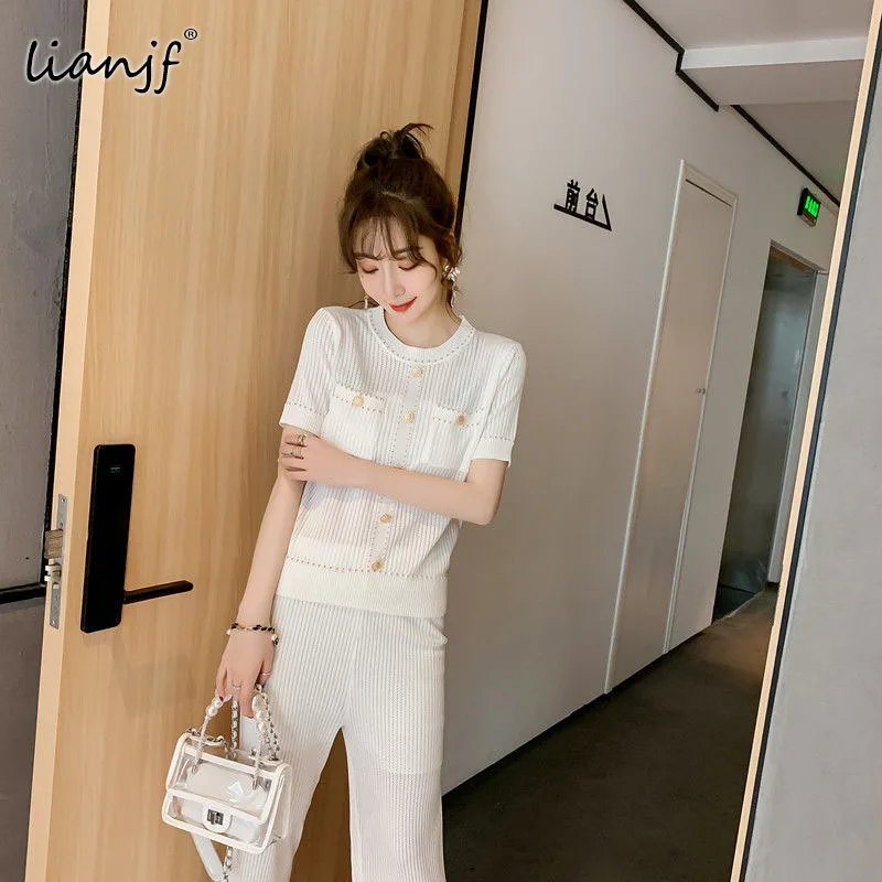 Summer Knitted Single-breasted Cardigan Top + High Waist Wide-leg Pants Suits Two-piece O-neck Short-sleeved T-shirt Women Suits
Summer Knitted Single-breasted Cardigan Top + High Waist Wide-leg Pants Suits Two-piece O-neck Short-sleeved T-shirt Women Suits
