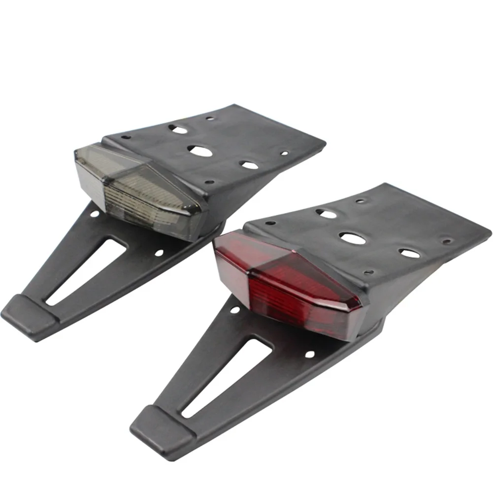 New Motorcycle Taillight Rear Fender Mudguard Mount Brake Light Turn Signal License Plate Light for Dirt Custom Off-Road Bike
New Motorcycle Taillight Rear Fender Mudguard Mount Brake Light Turn Signal License Plate Light for Dirt Custom Off-Road Bike