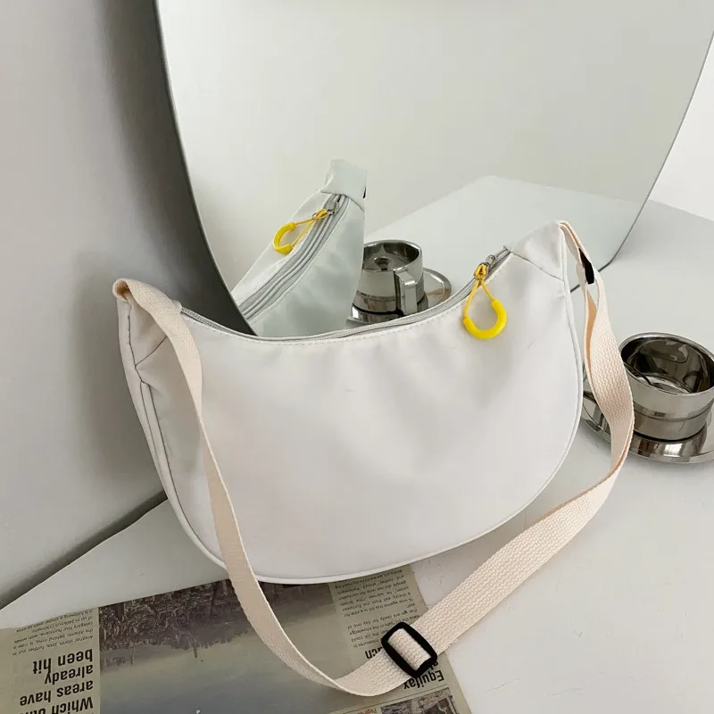 DOLOVE New Messenger Bag Female 2021 Fashion Korean Version Dumpling Crossbody Bag Light Bag Armpit Bag Single Shoulder Bag
DOLOVE New Messenger Bag Female 2021 Fashion Korean Version Dumpling Crossbody Bag Light Bag Armpit Bag Single Shoulder Bag