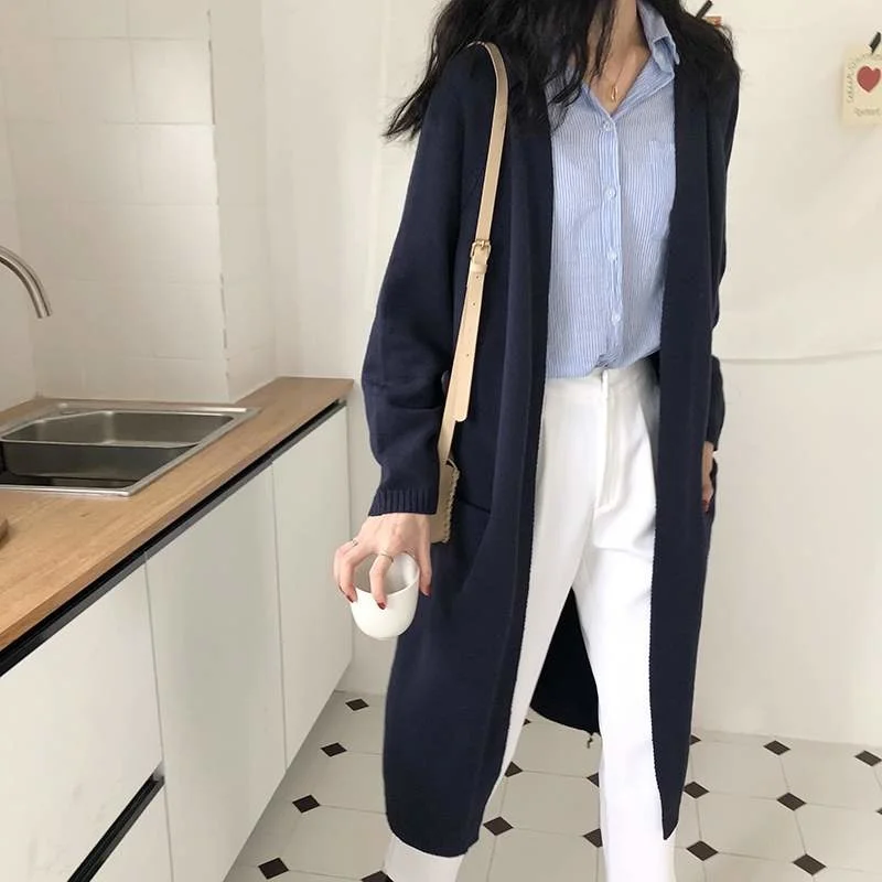 2021 autumn and winter new thickened Korean loose knee sweater knitted cardigan with medium and long jacket for women
2021 autumn and winter new thickened Korean loose knee sweater knitted cardigan with medium and long jacket for women