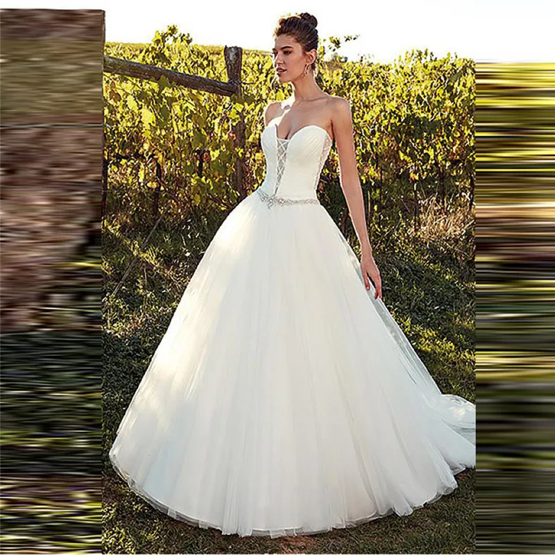 Sexy Sweetheart Ball Gown Wedding Dress Crystal Waistline Tulle Princess Garden Vintage Bridal Gowns Ladies Lower Backless
Sexy Sweetheart Ball Gown Wedding Dress Crystal Waistline Tulle Princess Garden Vintage Bridal Gowns Ladies Lower Backless