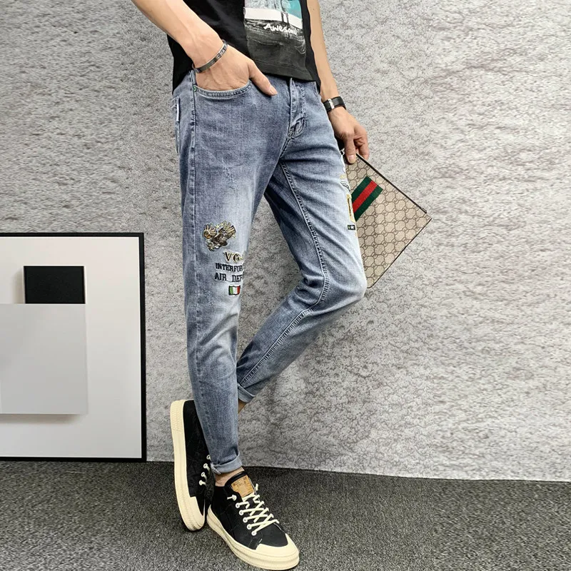 Spring and summer jeans men's personality embroidered ankle pants trendy brand light blue all-match small feet pencil pants
Spring and summer jeans men's personality embroidered ankle pants trendy brand light blue all-match small feet pencil pants