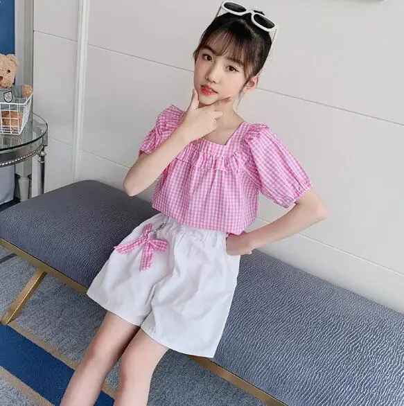 Summer 2021 Kids Clothing Sets Teen Girls Clothes Plaid Tops Shorts Suit Children Fashion Costume for Girls 4 6 8 10 12 Years 
Summer 2021 Kids Clothing Sets Teen Girls Clothes Plaid Tops Shorts Suit Children Fashion Costume for Girls 4 6 8 10 12 Years