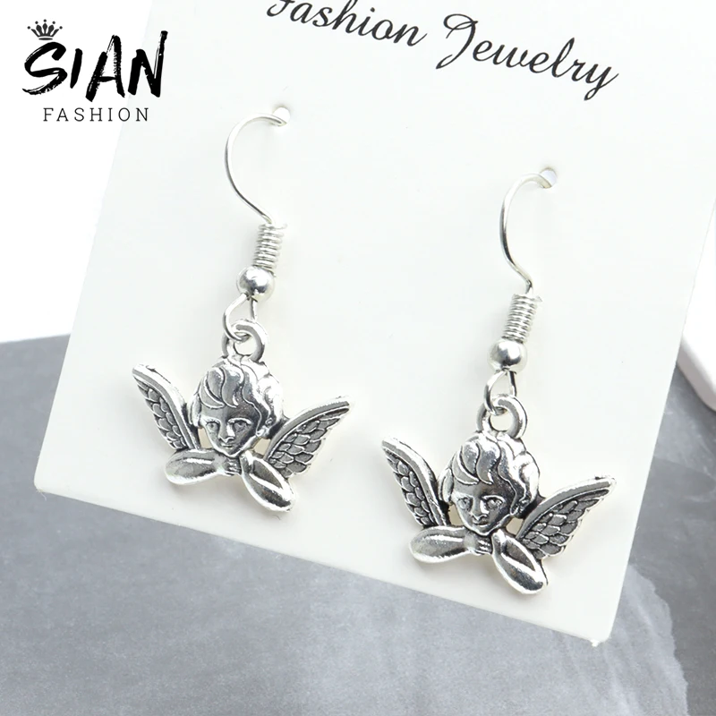 Cute Guardian Cupid Angel Drop Earrings Punk Vintage Pendant Alloy Dangle Earrings New Design Jewelry Trinket Wholesale Gifts
Cute Guardian Cupid Angel Drop Earrings Punk Vintage Pendant Alloy Dangle Earrings New Design Jewelry Trinket Wholesale Gifts