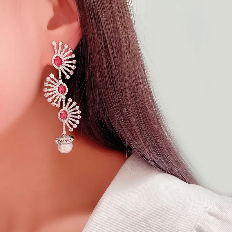 Three fan-shaped Pearl earrings long Pearl pendant earrings retro female fan-shaped exaggerated earrings online celebrity
Three fan-shaped Pearl earrings long Pearl pendant earrings retro female fan-shaped exaggerated earrings online celebrity