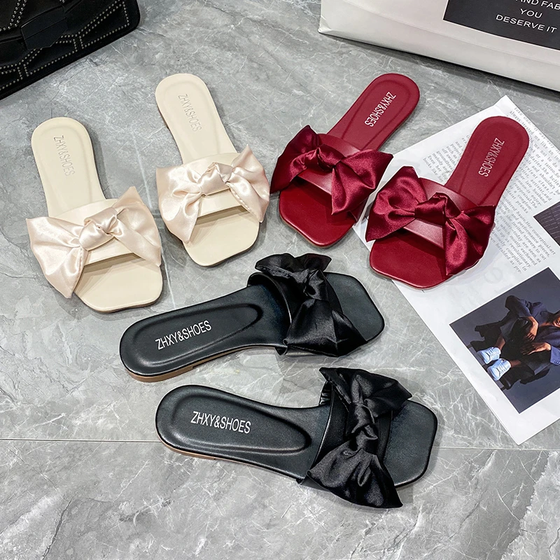 2021 New Fashion Ladies Solid Color Thick Bottom Outside Wear Bow Casual Slippers Open Toe Slippers Flat Causal Shoes Zapatillas
2021 New Fashion Ladies Solid Color Thick Bottom Outside Wear Bow Casual Slippers Open Toe Slippers Flat Causal Shoes Zapatillas