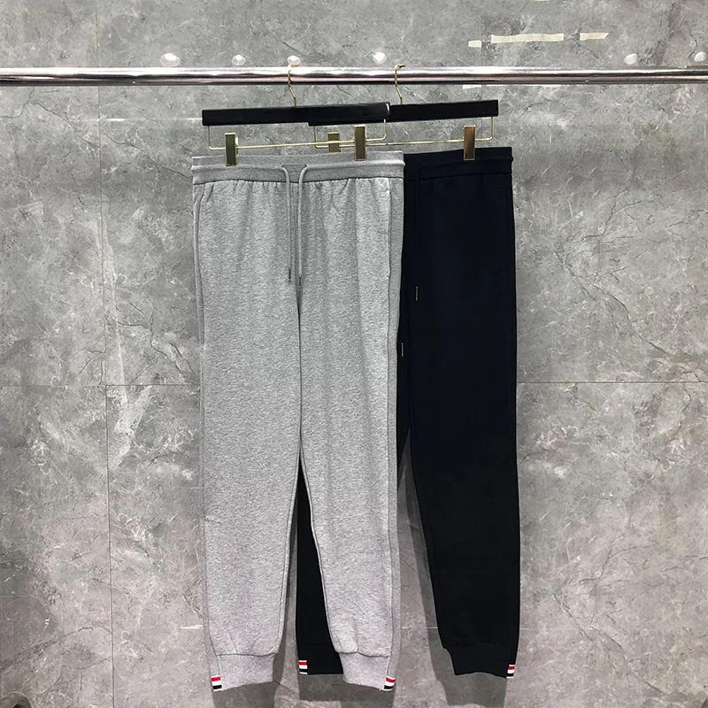 THOM TB Sweatpants Autunm Winter Men Women Custom Wholesale Pants Classic Cotton RWB Lower Hem Trim Stripe Trousers
THOM TB Sweatpants Autunm Winter Men Women Custom Wholesale Pants Classic Cotton RWB Lower Hem Trim Stripe Trousers