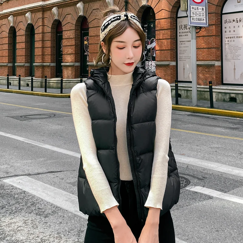 Women's Short Hooded Down Vest 2021 Autumn Winter New Korean Style Lightweight Down Jacket Solid Sleeveless Bread Vest Jacket
Women's Short Hooded Down Vest 2021 Autumn Winter New Korean Style Lightweight Down Jacket Solid Sleeveless Bread Vest Jacket