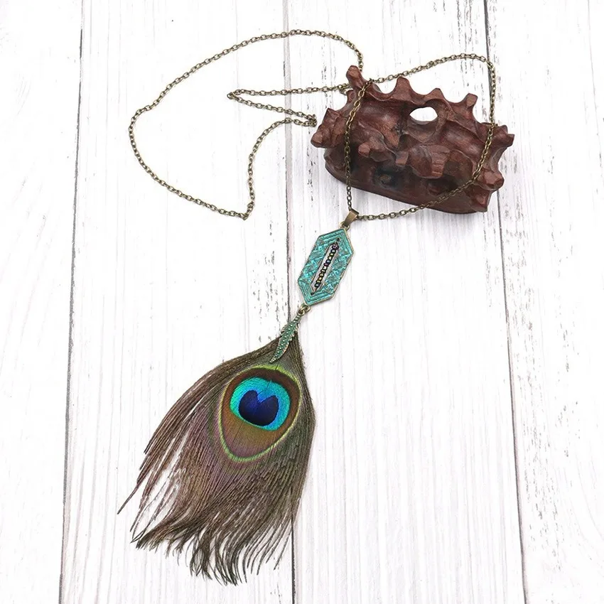 NEW Fashion National Style Necklace Geometric Inlaid Rice Bead Pendant Peacock Feather Sweater Chain
NEW Fashion National Style Necklace Geometric Inlaid Rice Bead Pendant Peacock Feather Sweater Chain