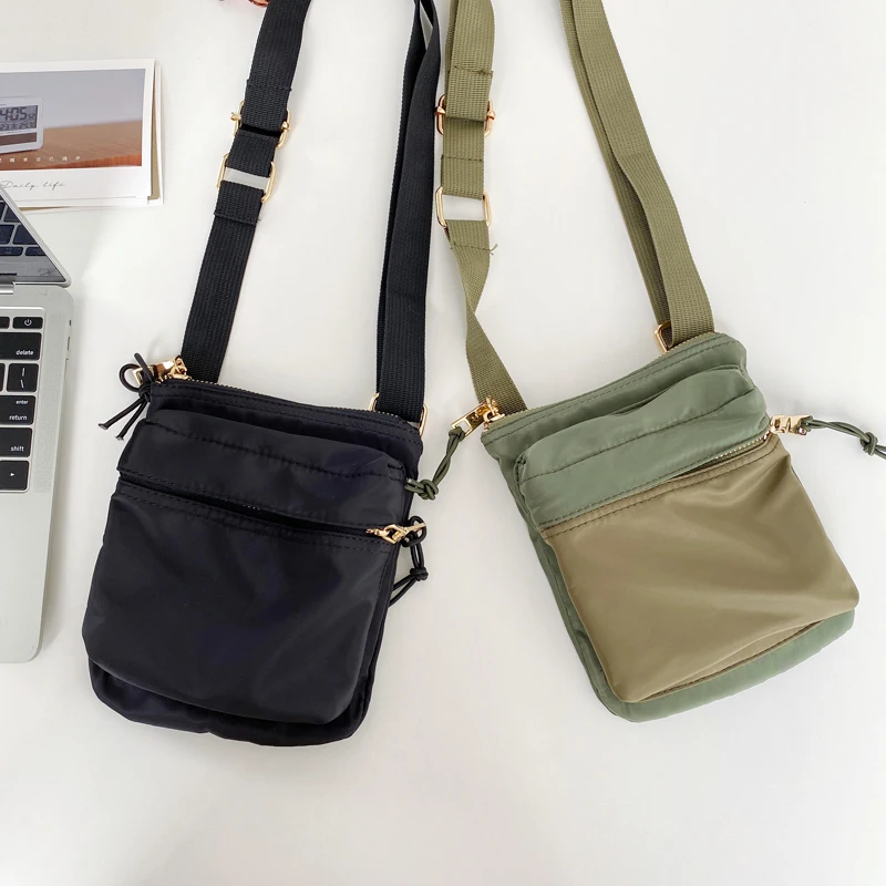 New Casual Canvas Bag Women Mini Crossbody Phone Bag Brand Designer Nylon Japan Style Ladies Shoulder Bag Youth Purse Whole Sale
New Casual Canvas Bag Women Mini Crossbody Phone Bag Brand Designer Nylon Japan Style Ladies Shoulder Bag Youth Purse Whole Sale