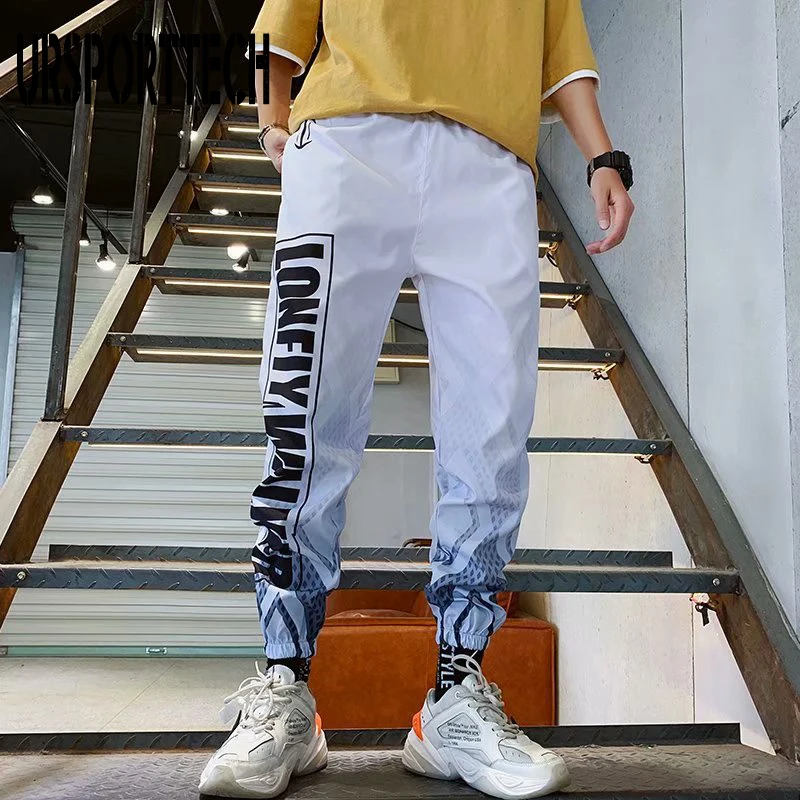 Streetwear Hip Hop Joggers Pants Men Loose Harem Pants Ankle Length Trousers Sport Casual Letter Print Sweatpants for Men
Streetwear Hip Hop Joggers Pants Men Loose Harem Pants Ankle Length Trousers Sport Casual Letter Print Sweatpants for Men