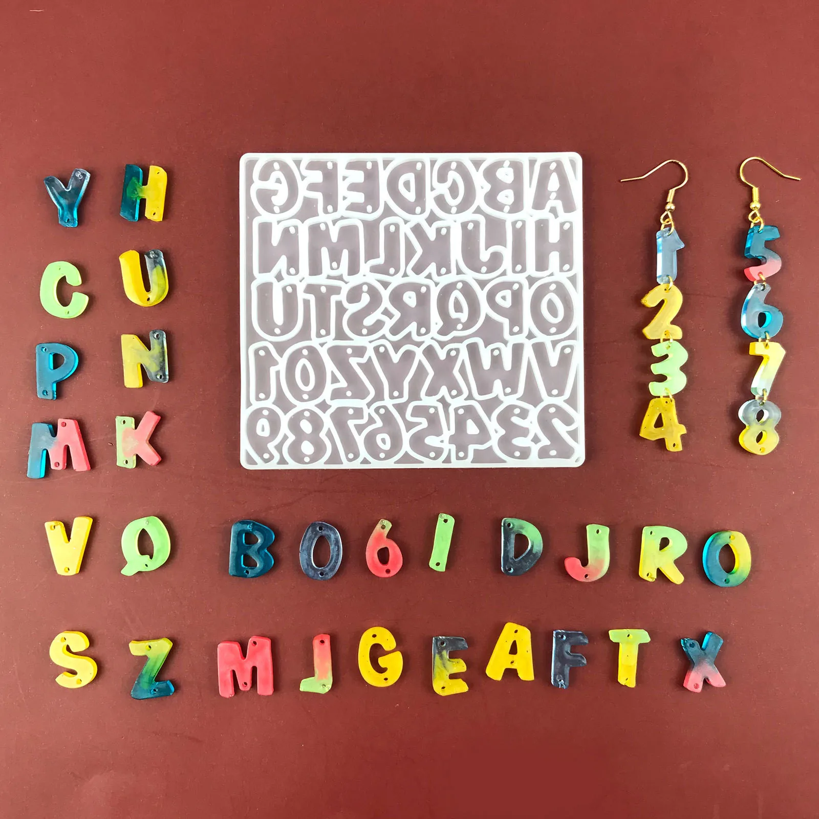 Digital Earrings Combination DIY Crystal Epoxy Silicone Mold Letter Earrings Bracelet Necklace Pendant Resin Mold
Digital Earrings Combination DIY Crystal Epoxy Silicone Mold Letter Earrings Bracelet Necklace Pendant Resin Mold