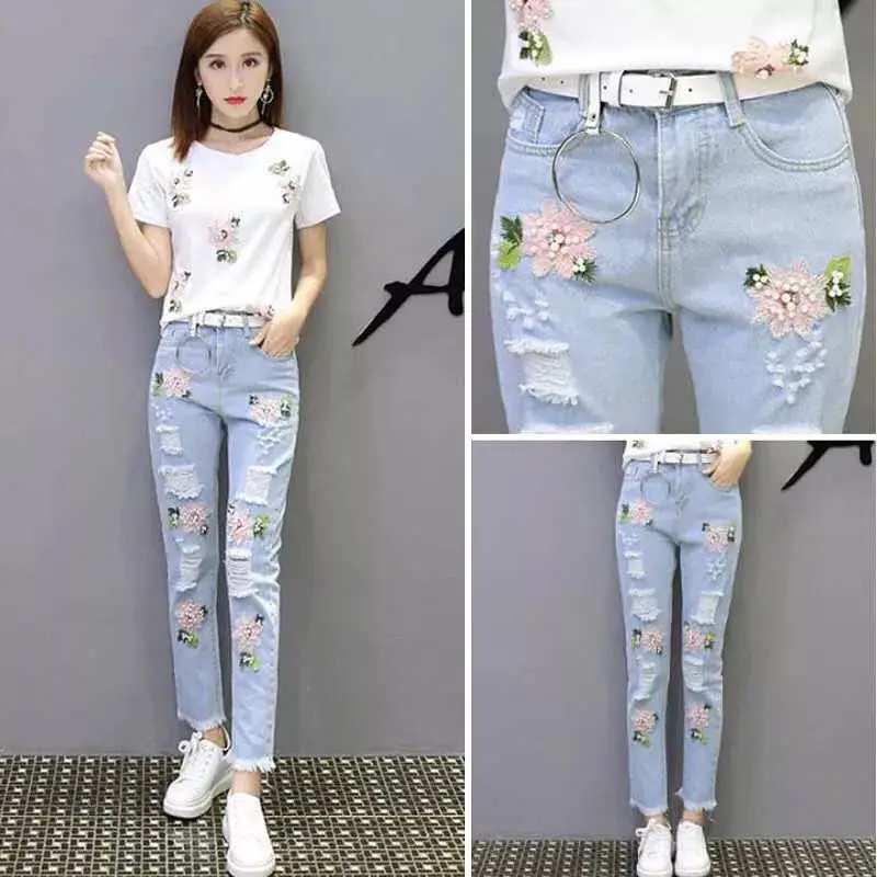 Heavy industry fashion holes inlaid with diamond, nail beads, embroidered jeans Capris, female students' versatile slim casual
Heavy industry fashion holes inlaid with diamond, nail beads, embroidered jeans Capris, female students' versatile slim casual
