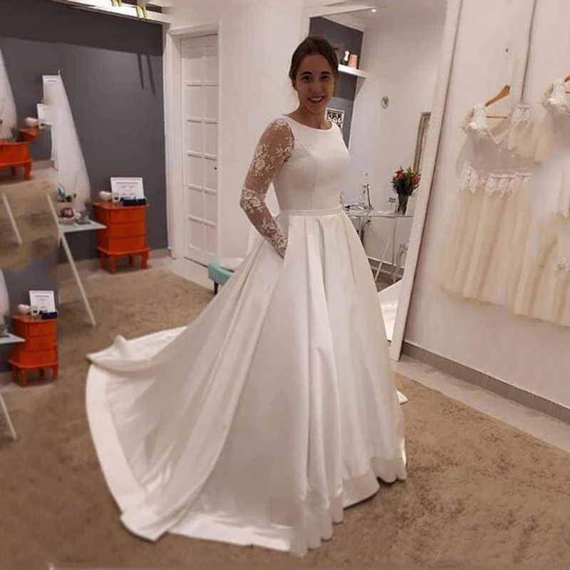 Long Sleeves Lace Appliques Illusion A-Line Wedding Dresses 2020 New arrival Scoop Neck Court Train Satin Wedding Bridal Gowns
Long Sleeves Lace Appliques Illusion A-Line Wedding Dresses 2020 New arrival Scoop Neck Court Train Satin Wedding Bridal Gowns