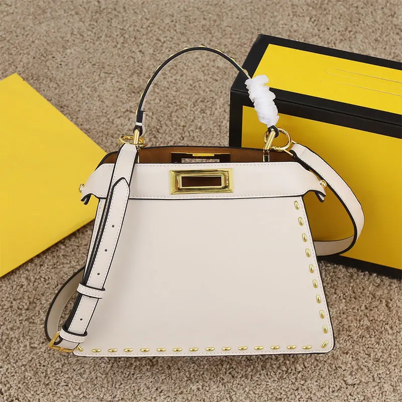 TOP design leather peek—aboo handbag, ladies' new fashion rivet design shoulder bag messenger bag, casual and versatile
TOP design leather peek—aboo handbag, ladies' new fashion rivet design shoulder bag messenger bag, casual and versatile