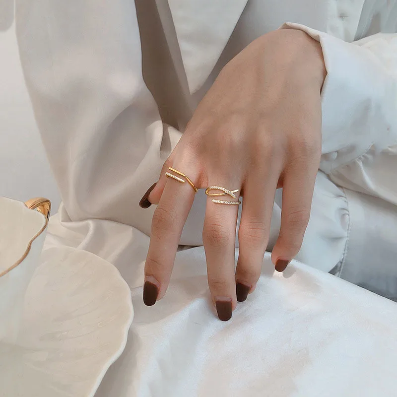 PANJBJ 925 Sterling Silver Double Layer Cross Open Rings for Women Gold Color Shiny Cubic Zircom Geometric Line Rings
PANJBJ 925 Sterling Silver Double Layer Cross Open Rings for Women Gold Color Shiny Cubic Zircom Geometric Line Rings