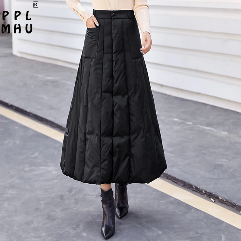 Plus thick warm large hem down A-line skirt women solid colors black button high waisted loose long skirt 2020 new winter skirt
Plus thick warm large hem down A-line skirt women solid colors black button high waisted loose long skirt 2020 new winter skirt