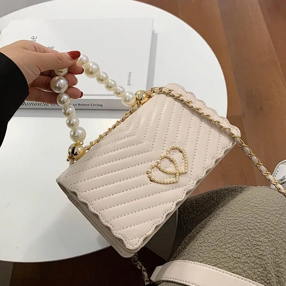 Sweet Lady Pearl Tote Bag 2020 Fashion New High Quality PU Leather Women's Designer Handbag Travel Chain Shoulder Messenger Bag 
Sweet Lady Pearl Tote Bag 2020 Fashion New High Quality PU Leather Women's Designer Handbag Travel Chain Shoulder Messenger Bag