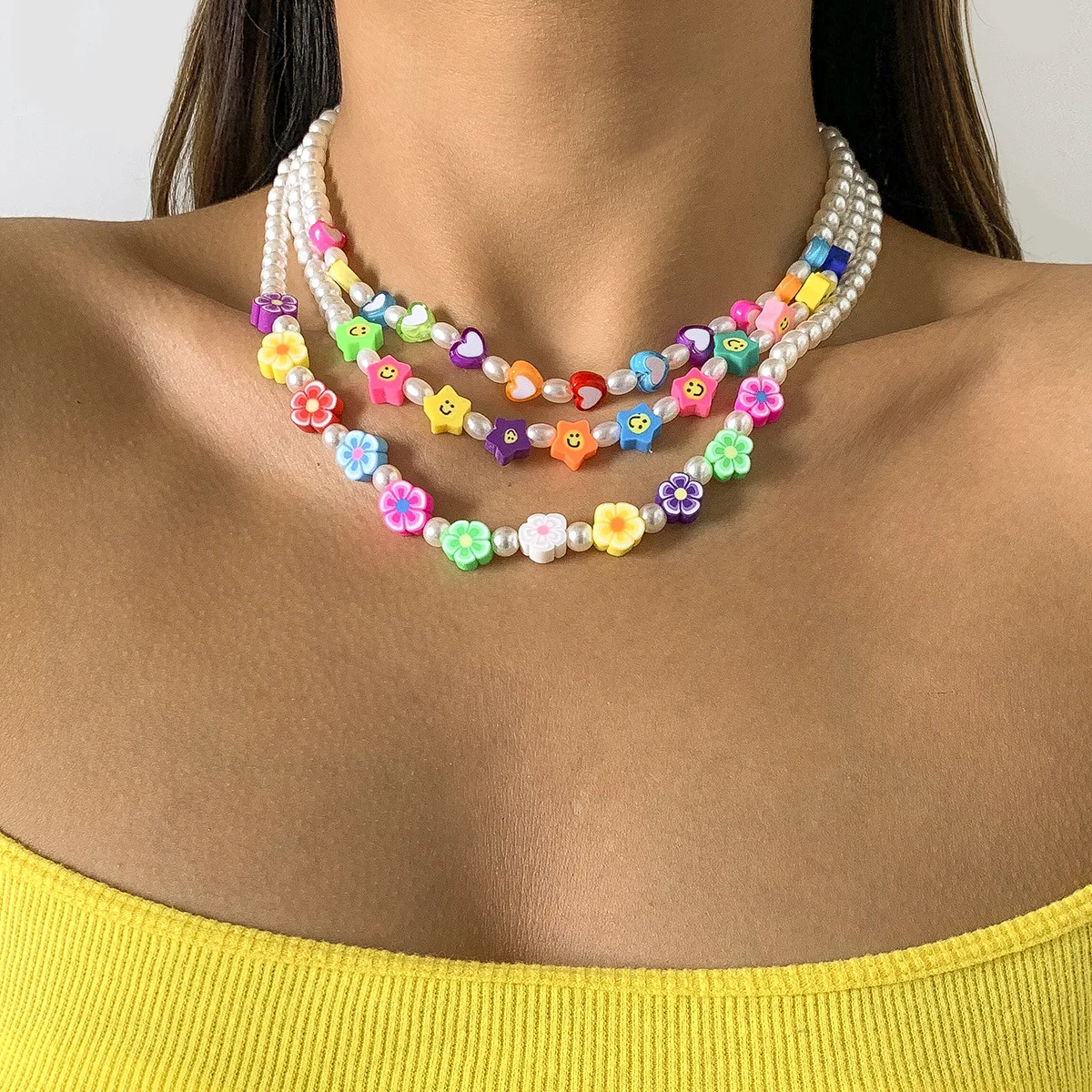 Pastoral ethnic necklace for female with multicolor soft ceramic flower clavicle chain geometric round bead acrylic necklace
Pastoral ethnic necklace for female with multicolor soft ceramic flower clavicle chain geometric round bead acrylic necklace