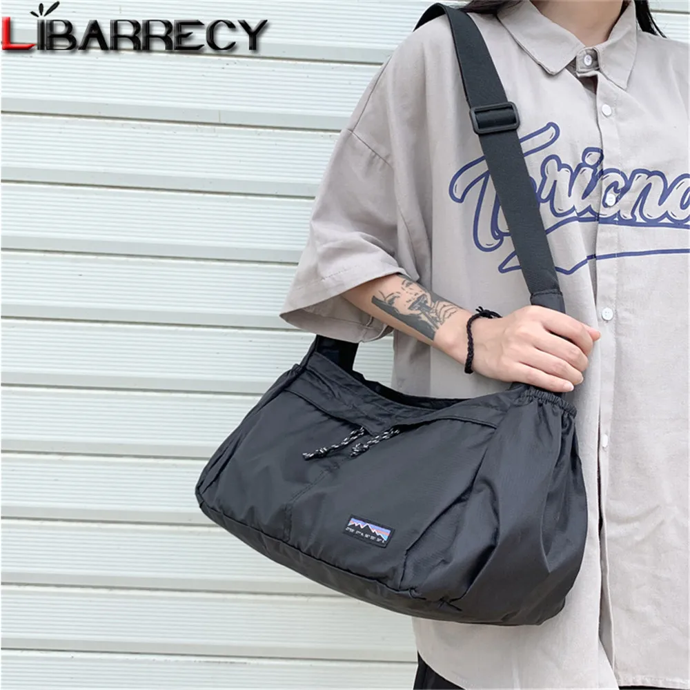 Solid Color Large Capacity Students Multifunction Bags Travel Bag High Quality Oxford Ladies Messenger Bag Women Shoulder Bags
Solid Color Large Capacity Students Multifunction Bags Travel Bag High Quality Oxford Ladies Messenger Bag Women Shoulder Bags