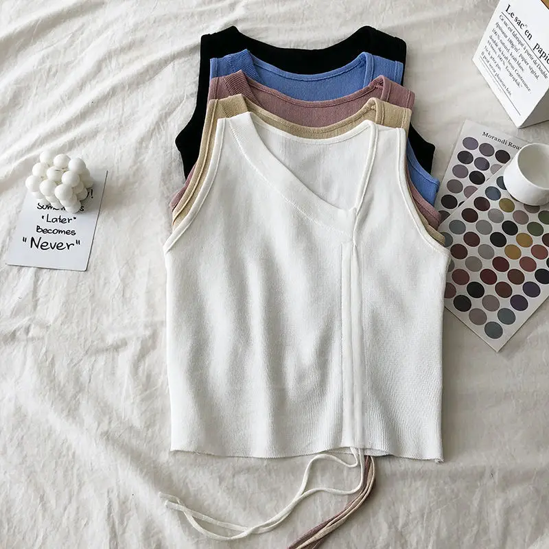 V-neck summer knitted vest top sleeveless ladies sexy drawstring design camisole T-shirt white strapless ribbed vest casual
V-neck summer knitted vest top sleeveless ladies sexy drawstring design camisole T-shirt white strapless ribbed vest casual