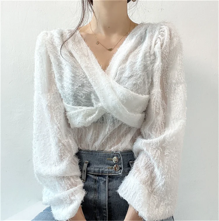 ZCSMLL Sexy Cross V-neck Loose Three-dimensional Tassel Micro-transparent Long-sleeved Shirt for Women 2021 Spring Summer
ZCSMLL Sexy Cross V-neck Loose Three-dimensional Tassel Micro-transparent Long-sleeved Shirt for Women 2021 Spring Summer