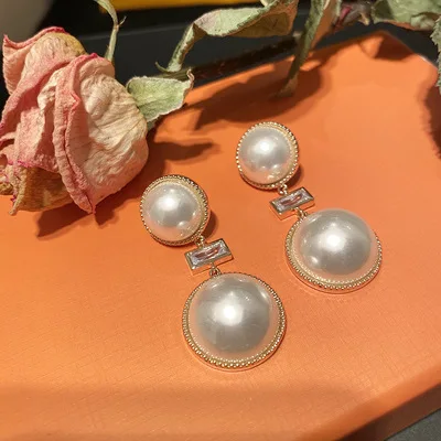 Pearl earrings women's high atmosphere exaggerated earrings big pearl earrings simple style
Pearl earrings women's high atmosphere exaggerated earrings big pearl earrings simple style