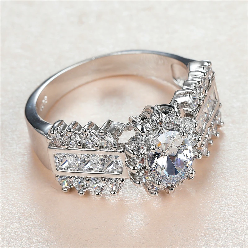 Vintage Female White Crystal Stone Ring Charm Silver Color Big Wedding Rings For Women Trendy Oval Zircon Engagement Ring
Vintage Female White Crystal Stone Ring Charm Silver Color Big Wedding Rings For Women Trendy Oval Zircon Engagement Ring