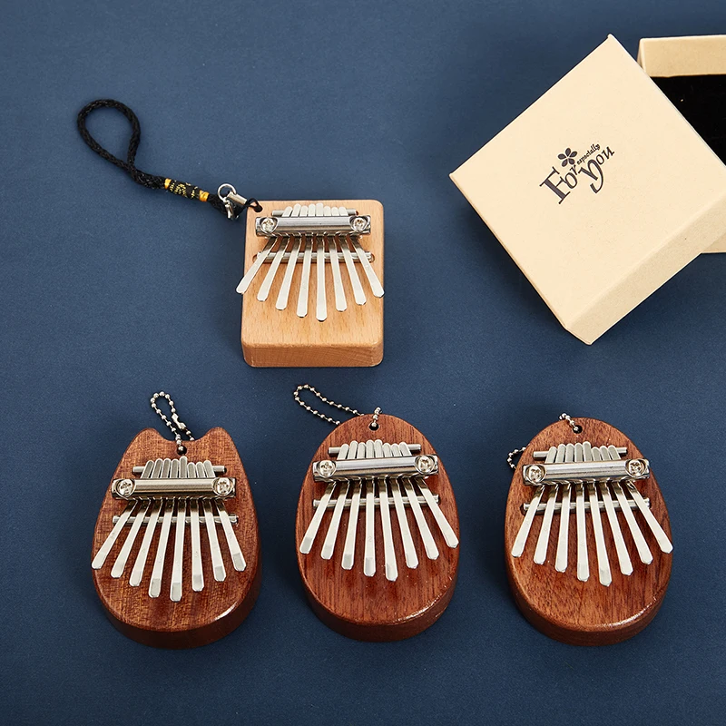 1PCS Wood Newest Mini 8 Keys Thumb Piano Great Sound Finger Keyboard Musical Instrument Wooden Gifts
1PCS Wood Newest Mini 8 Keys Thumb Piano Great Sound Finger Keyboard Musical Instrument Wooden Gifts