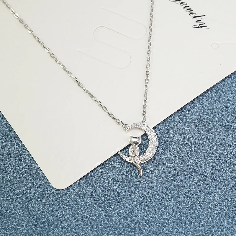 Женское ожерелье из серебра 925 пробы с подвеской в виде кота и Луны 
Женское ожерелье из серебра 925 пробы с подвеской в виде кота и Луны