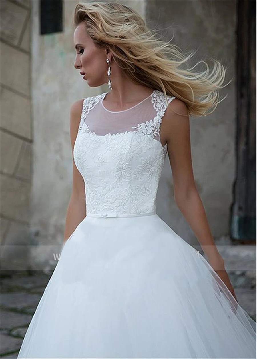 2019 White Tulle Formal Wedding Gowns Scoop Sweep Train Tulle Appliques A-line Natural-Waisted Custom-Made Illusion Bridal Dress
2019 White Tulle Formal Wedding Gowns Scoop Sweep Train Tulle Appliques A-line Natural-Waisted Custom-Made Illusion Bridal Dress
