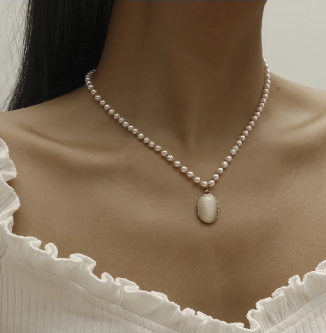 Vintage Pearl Oval Gemstone Choker Necklace Clavicle alloy Chain Pendant Fashion Jewelry for women
Vintage Pearl Oval Gemstone Choker Necklace Clavicle alloy Chain Pendant Fashion Jewelry for women