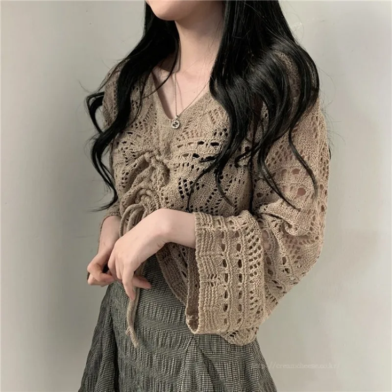 

2021 Flare Sleeve V Neck Knitted Women Shirts Autumn Korean Women Tops And Blouses Drawstring Hollow Out Sexy Top Mujer 10194