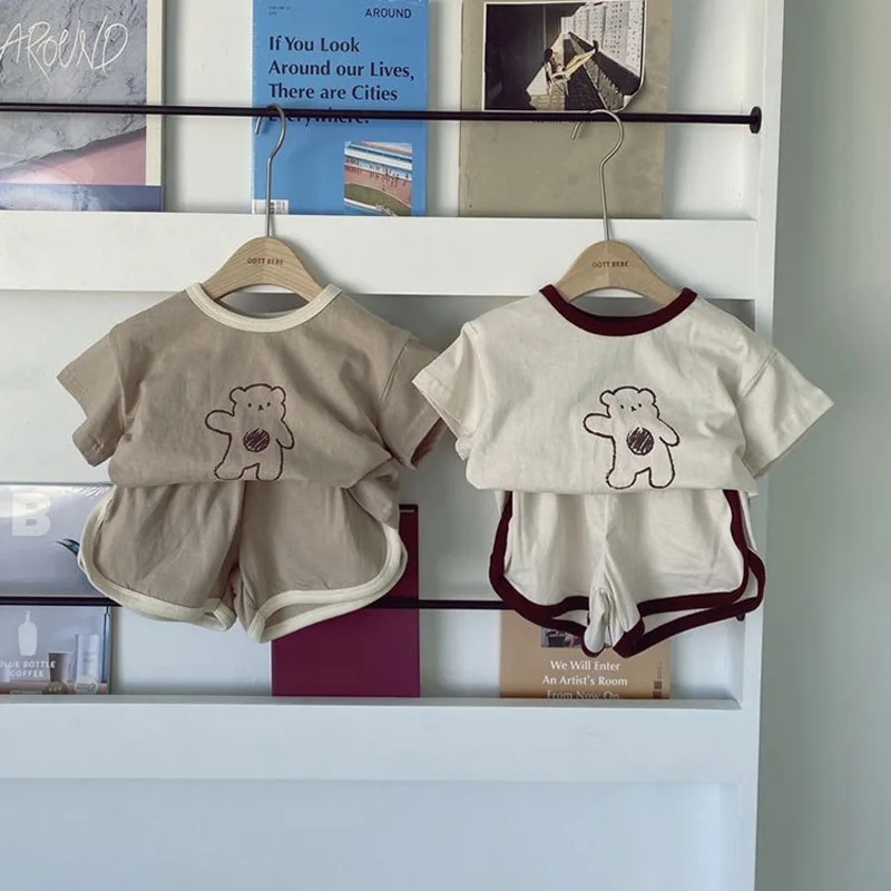 Summer New Toddler Baby Clothes Set Boy Girl Fashion Casual Cartoon Bear Pattern Short Sleeve Tops + Kid Cotton Soft Shorts 2pcs
Summer New Toddler Baby Clothes Set Boy Girl Fashion Casual Cartoon Bear Pattern Short Sleeve Tops + Kid Cotton Soft Shorts 2pcs