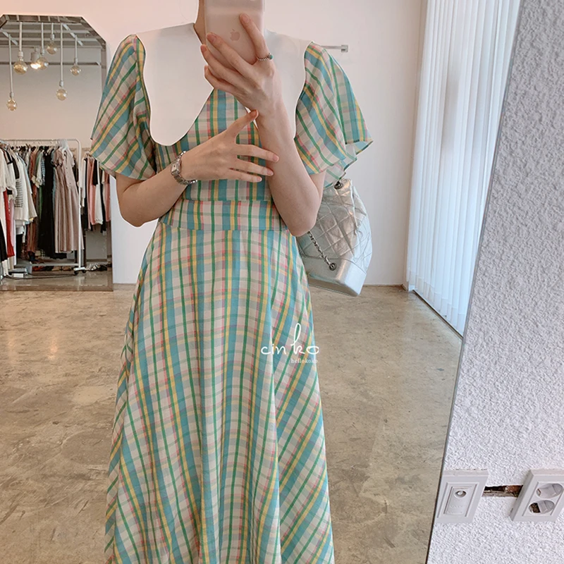 Plaid woman dress V Neck High Waist Casual holiday dresses for women Short Sleeves Loose Fit long vestidos 2021
Plaid woman dress V Neck High Waist Casual holiday dresses for women Short Sleeves Loose Fit long vestidos 2021