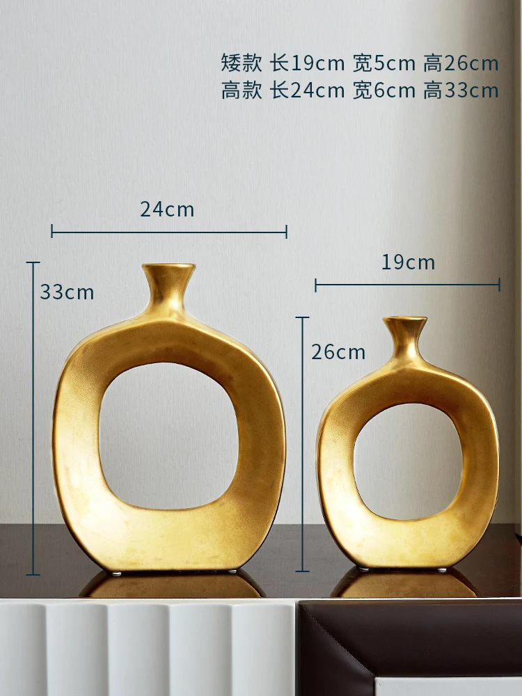 Nordic golden ceramic vase modern home decoration ornaments countertop vase creative living room flower arrangement vase
Nordic golden ceramic vase modern home decoration ornaments countertop vase creative living room flower arrangement vase