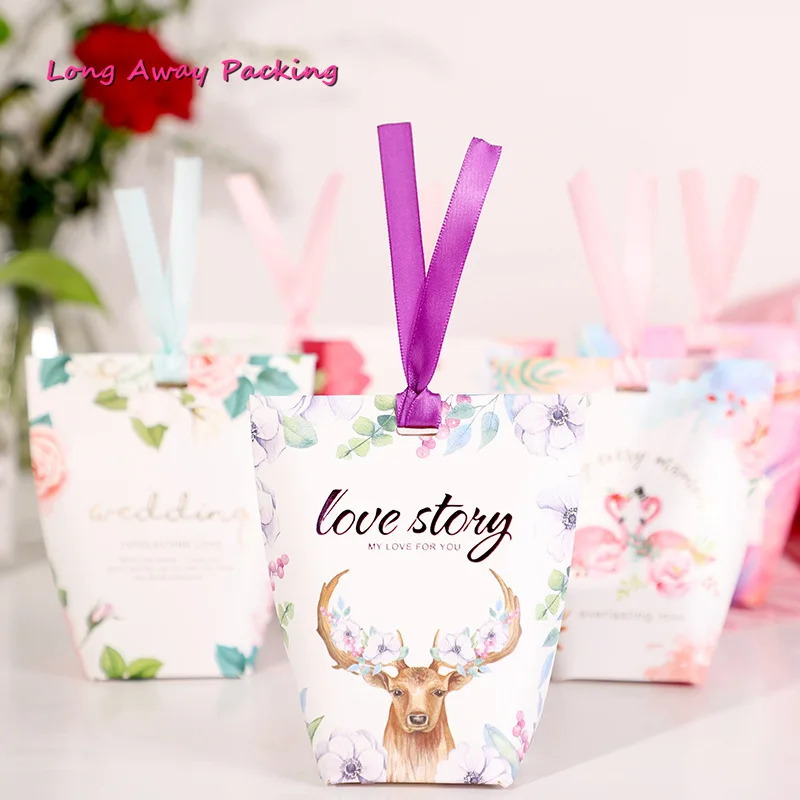 Flowers Priting Pillow Box for Chocolate Candy Cookie Wedding Party Baby Shower Packaging Boxes with Ribbon
Flowers Priting Pillow Box for Chocolate Candy Cookie Wedding Party Baby Shower Packaging Boxes with Ribbon